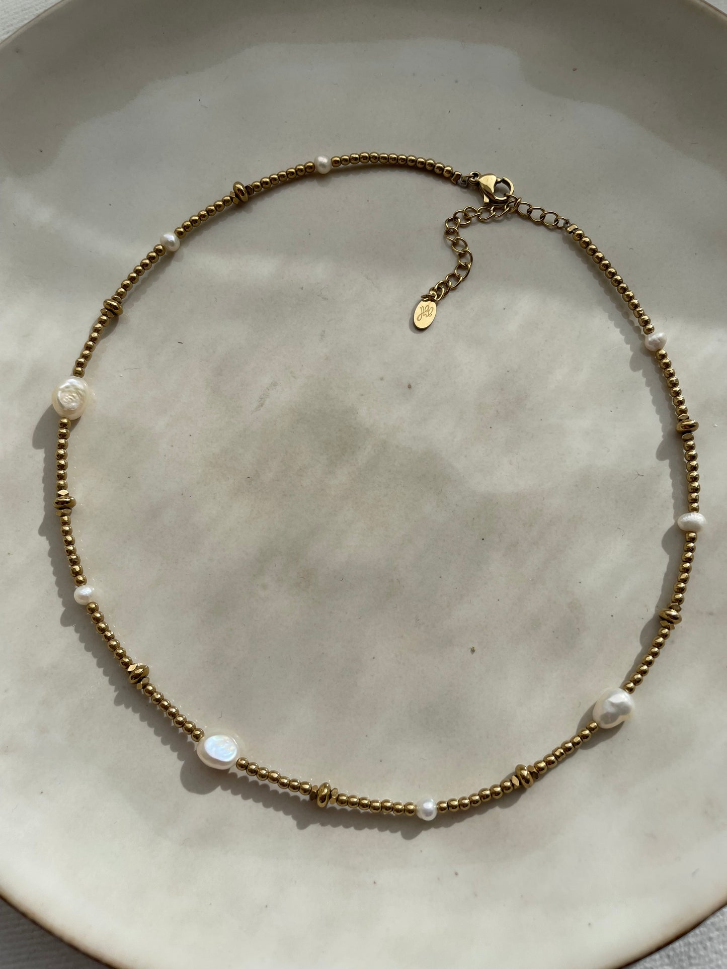 Golden pearl necklace gold