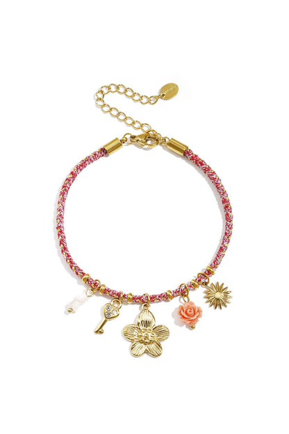 Multiple charm flower power bracelet gold