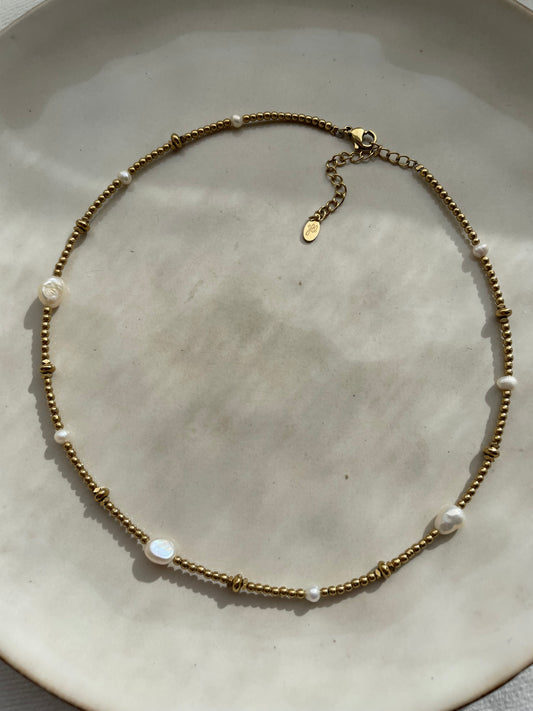 Golden pearl necklace gold